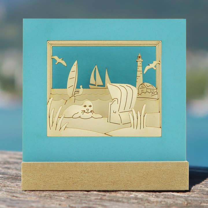 Strandwelt-Silhoubox M … Surfen, Segeln, Robbe, Leuchtturm – Geschenkartikel für den Großhandel von SILHOUBOX