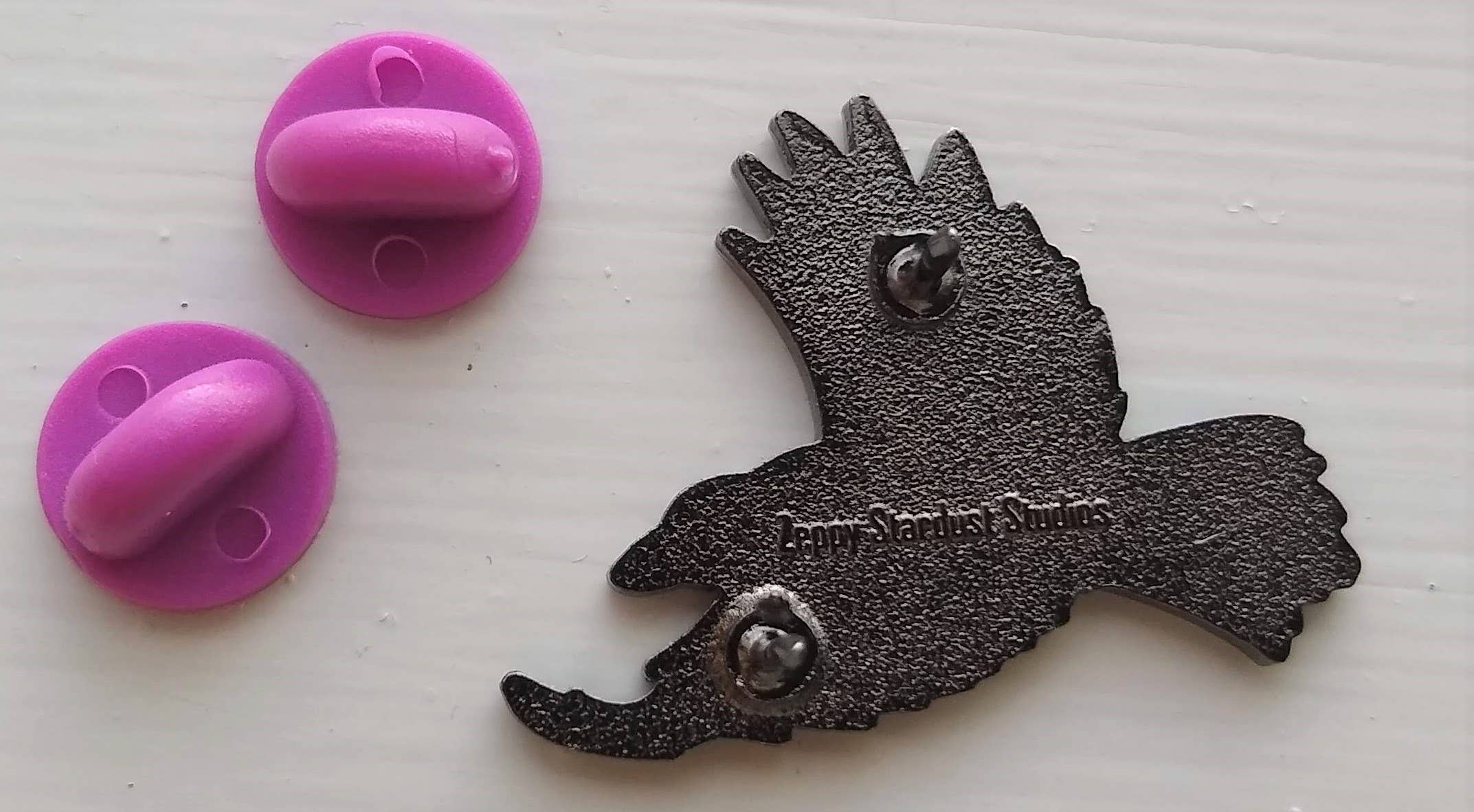 Zeppy Stardust Studios - Wholesale Lapel Pin/Button - Disco Nails Purple Crow Hard Enamel Pin1