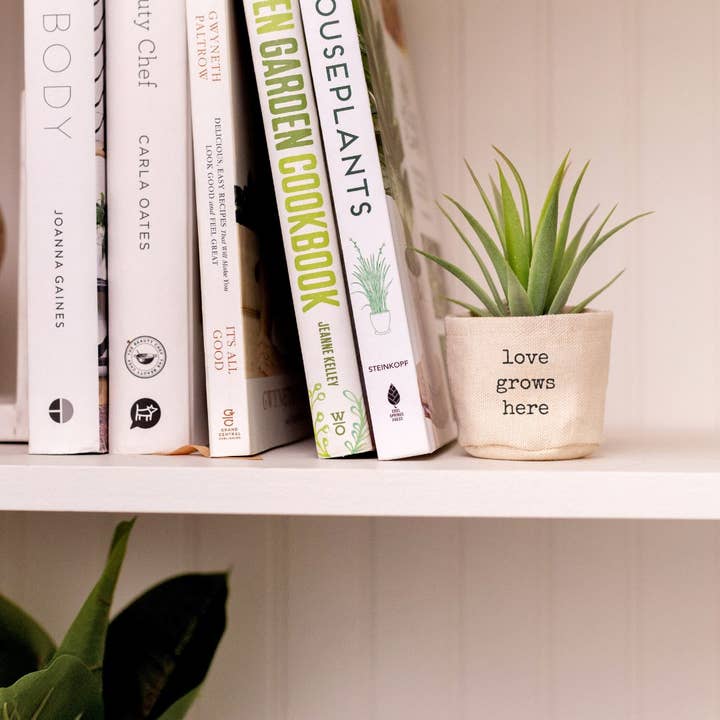 Leaf and Root Co. - Wholesale Plant pot - love grows here 2" Canvas Plant Pot Cover1