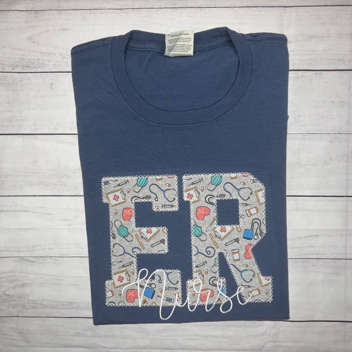 ER Nurse Applique Short Sleeve TShirt for wholesale by Handmade Pieces Company LLC