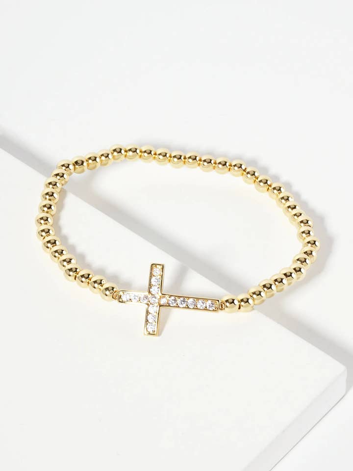 18K Gold-Dipped Cubic Zirconia Sideways Cross Bracelet for wholesale by Wild Honey