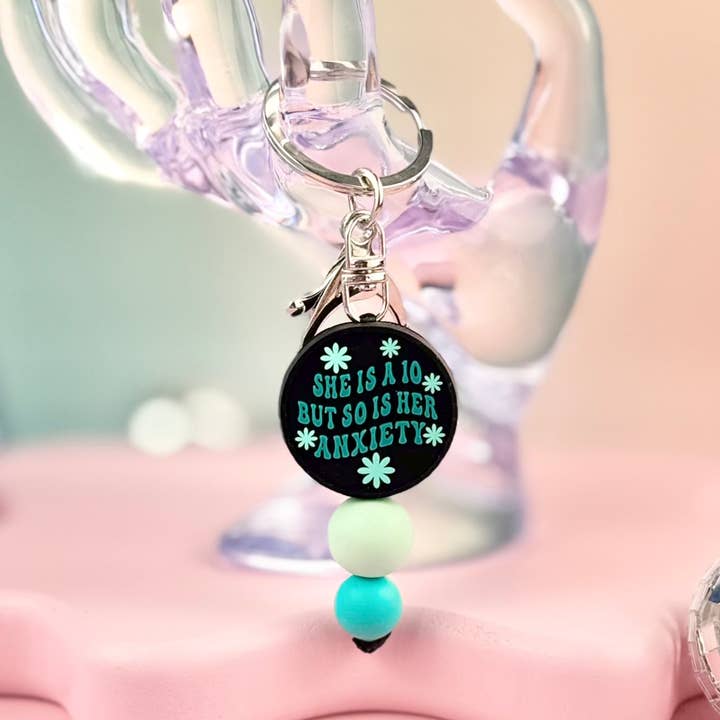 She's A Ten But So Is Her Anxiety Keychain for wholesale by HandCrofted