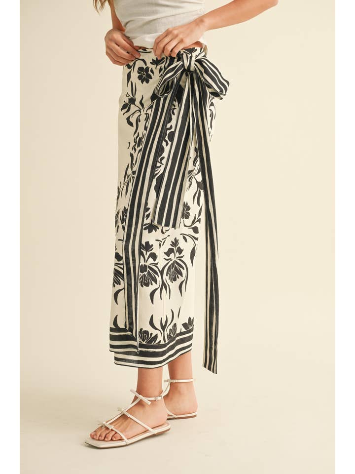 Black S5512 FLORAL PRINT LINEN WRAP SKIRT for wholesale on Faire