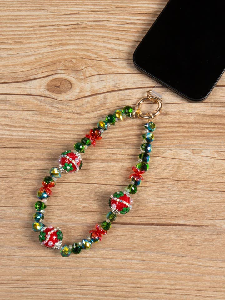 Thème de vacances : Lanière de poignet pour téléphone avec éléments de Noël K1345 pour la vente par Ole