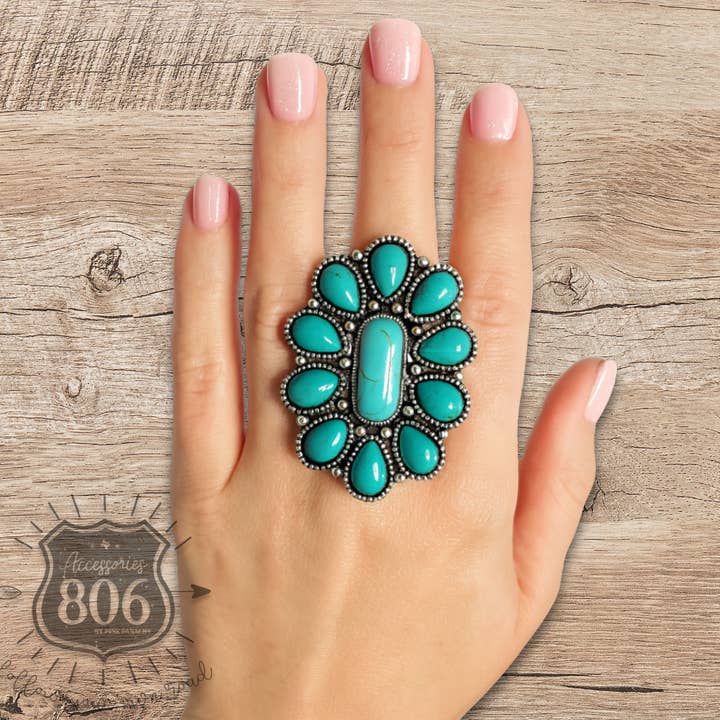 Turquoise color oval flower ring for wholesale by Pink Panache Brands