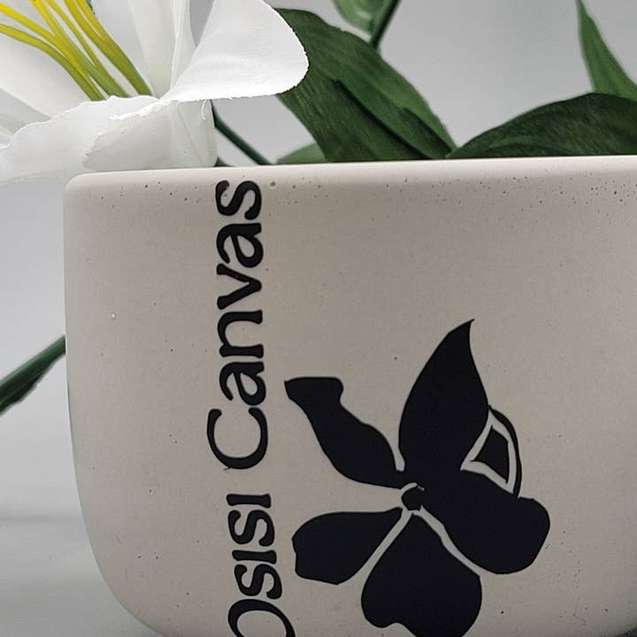 Orchid & Lily scented candle for wholesale by Osisi Canvas