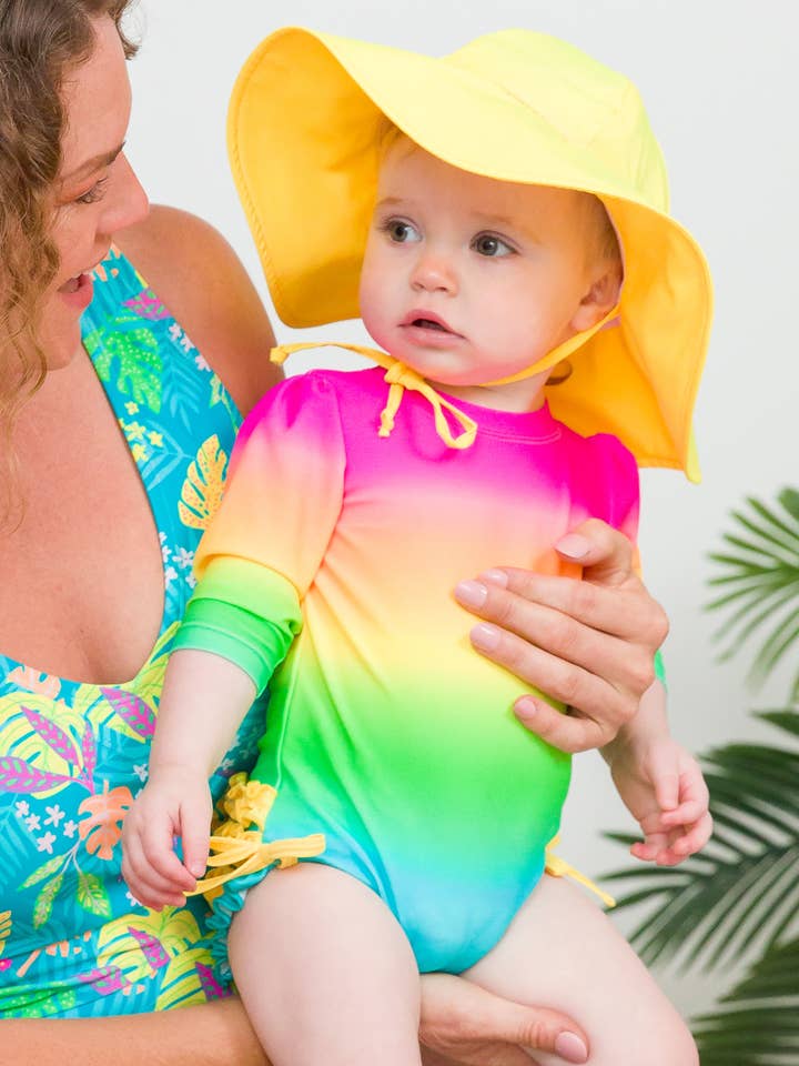 Orange Baby Girls Neon Sunset Long Sleeve One Piece Rash Guard Swimsuit with Signature Rear Ruffles
for wholesale on Faire