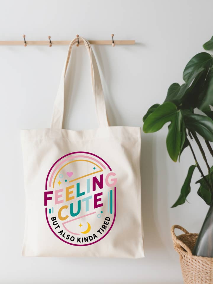 Feeling Cute But Tired Canvas Tote Bag for wholesale by EnchantingSunshine