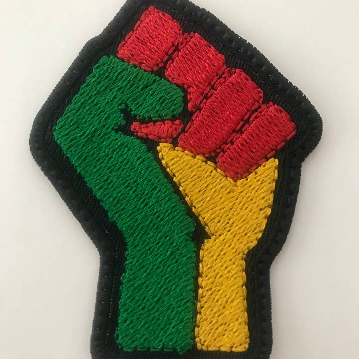 - Rasta Pugno Brown Pride in vendita all'ingrosso su Faire1