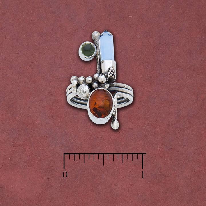 Ovaler Bernstein mit Amethystspitze und Larimar-Kabinenring für den Großhandel von Tidepool