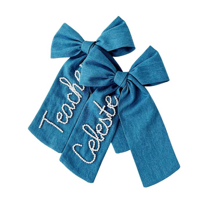 Medium Wash Pearl Wash Denim Bow for wholesale by Bebe Theory