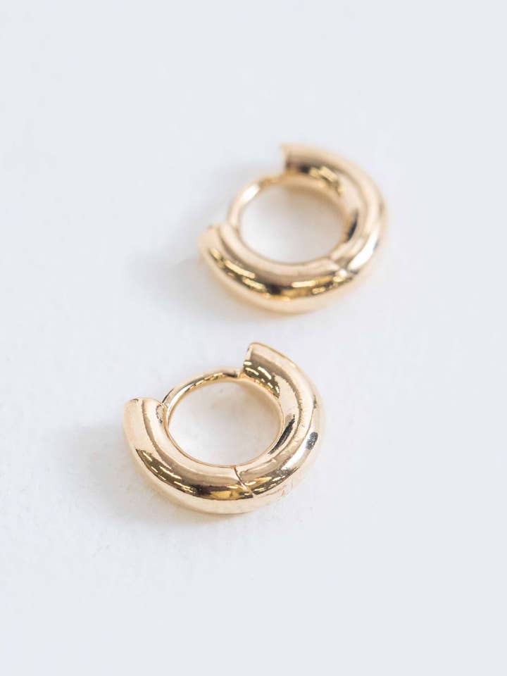 Mini Bolded Huggie Hoop Earrings | Gold for wholesale by Lovoda