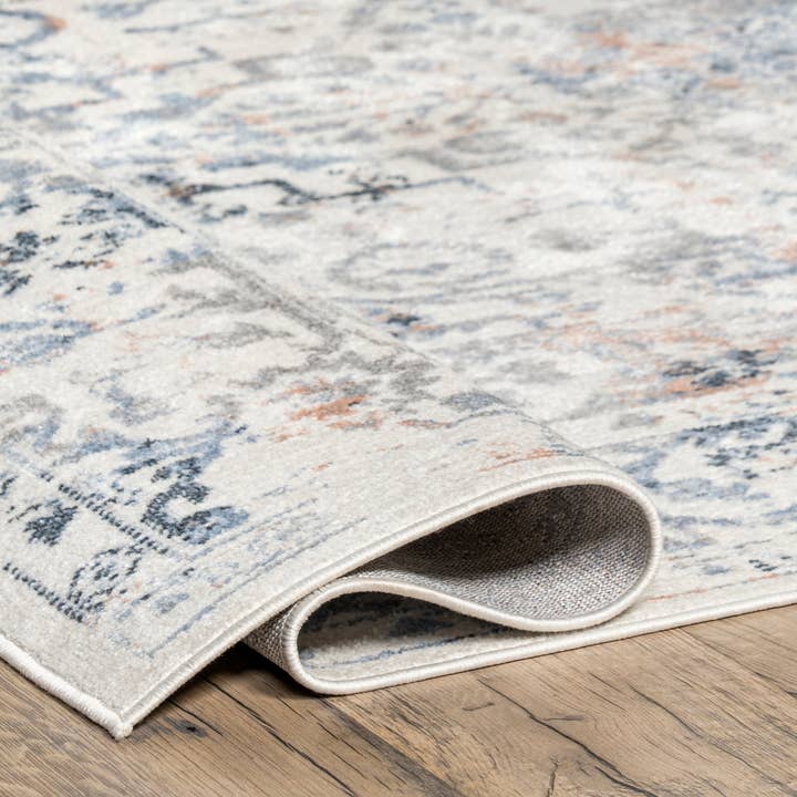 Beige Everlee Faded Persian Machine Washable Area Rug for wholesale on Faire2