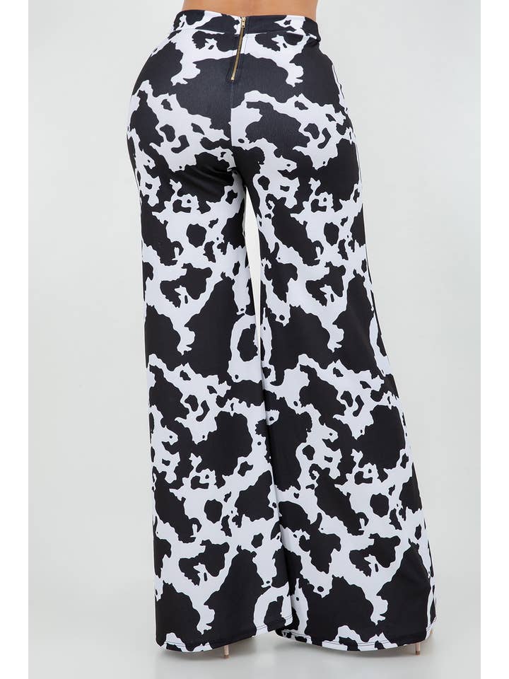 BLACK WHITE B11401 TECHNO CREPE COW PRINT PANTS WITH BACK METAL ZIPPER for wholesale on Faire2