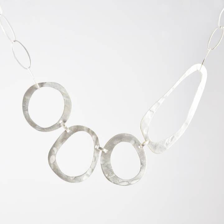 Abstract Hammered Cut-Out Circle Bib Necklace for wholesale by Jane Diaz NY