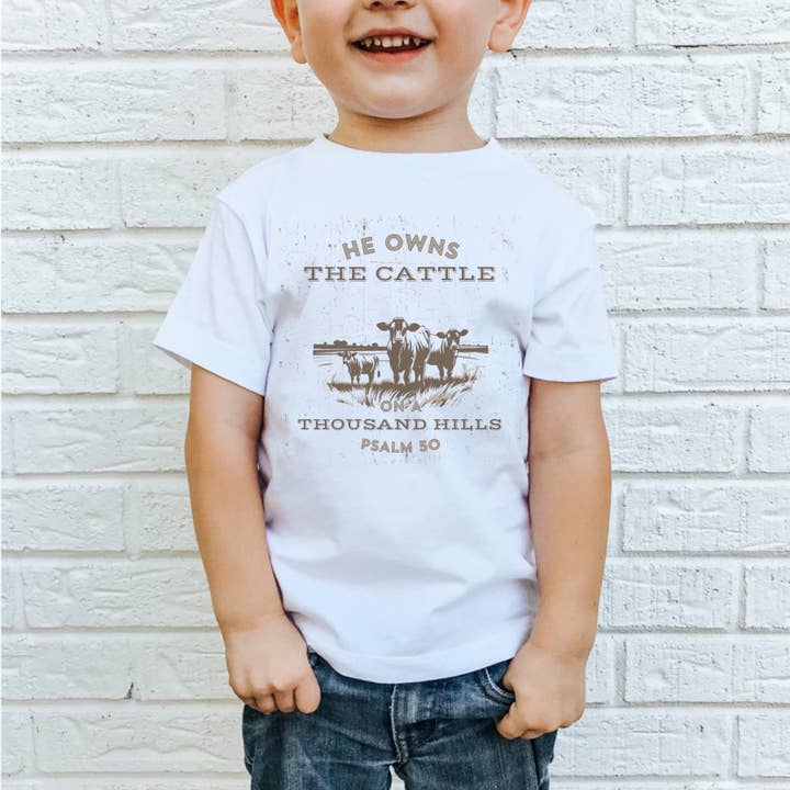 T-shirt chrétien pour tout-petit He Owns The Cattle pour la vente par Painted Skies