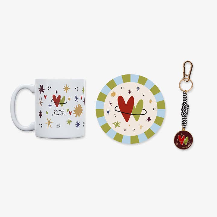Sleutelhanger Set + Mok + Onderzetters "In mijn glow tijdperk" voor wholesale door UO