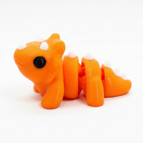 Triceratops Dinosaur (Orange) • Mini 3D Printed Articulated Animal • Flexi Animals for wholesale by Lorianne Kol 3D Prints