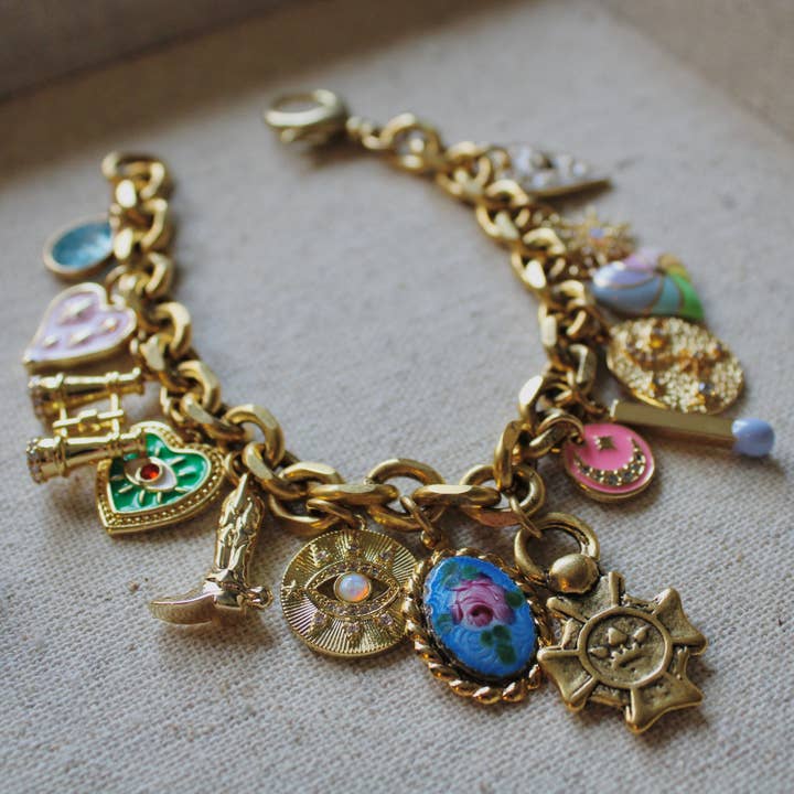 Antiqued Gold Charm Bracelet for wholesale on Faire