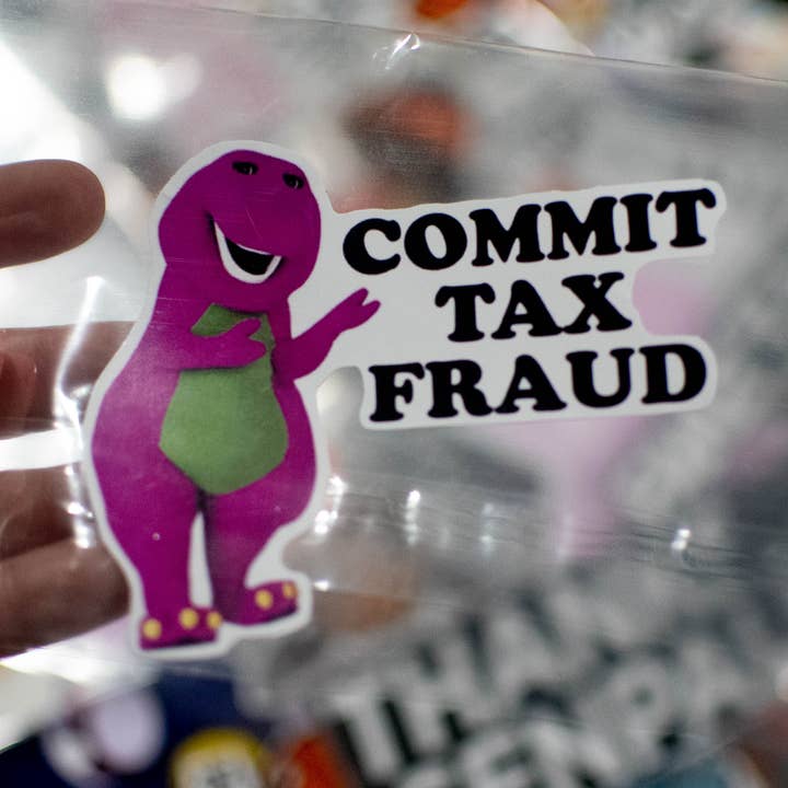 Commit Tax Fraud Barney for wholesale by Unhinged Sticker Co.