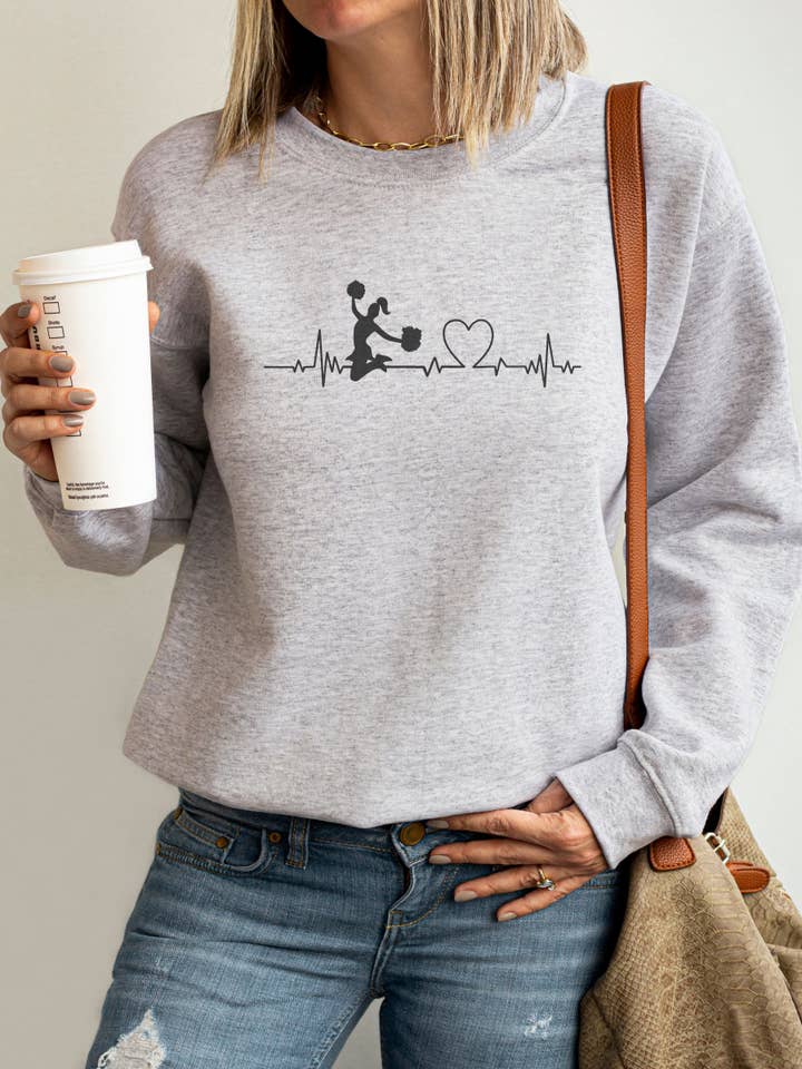 Cheerleader Heartbeat Graphic Sweatshirt for wholesale by Fan Gear Central
