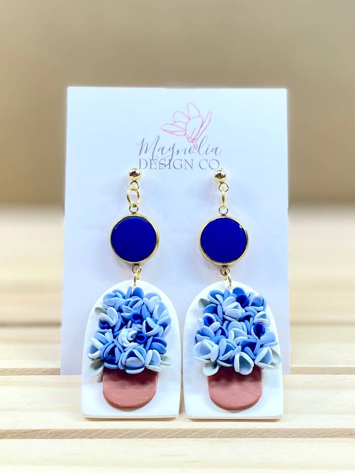 Blue Floral Bouquet Arch for wholesale by Magnolia Design Company