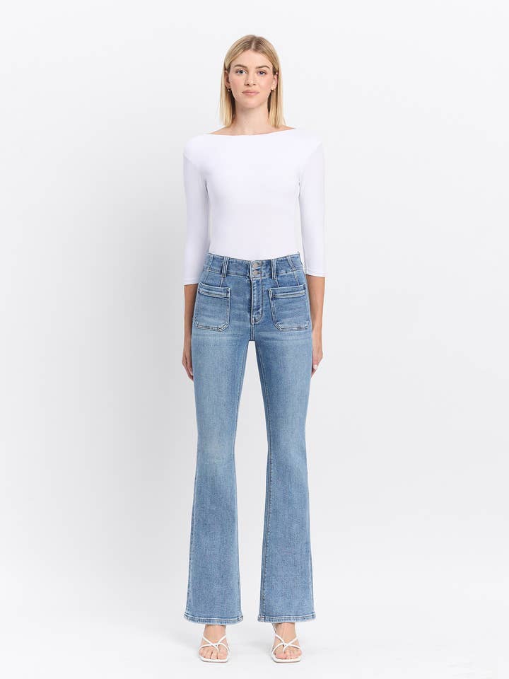 JEANS SVASATI CON TASCA FRONTALE A VITA ALTA CON DETTAGLIO A FRECCETTE F5510 per la vendita all'ingrosso da parte di FLYING MONKEY