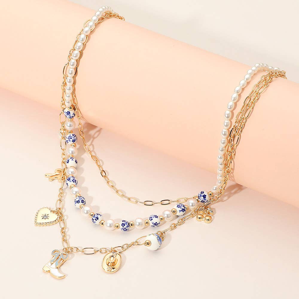 Sensibling Corp. - Wholesale Pendant/Charm Necklace - Western Cowboy Boot Hat Bow Cherry Heart Charm Station Pearl Floral Ceramic Ball Beaded Layered Necklace9