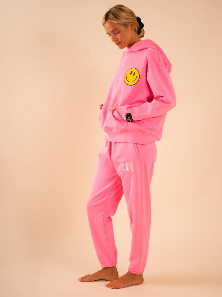 Rosa Hendrix Sudadera 100 Cosas Feliz Rosa de venta al por mayor en Faire1