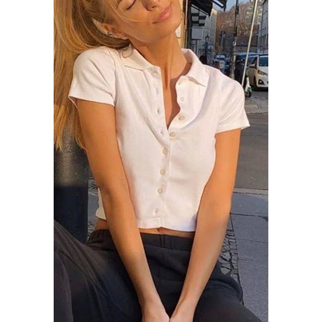 PULSANTE RITAGLIATO IN ALTO per la vendita all'ingrosso da parte di TREND SHOP