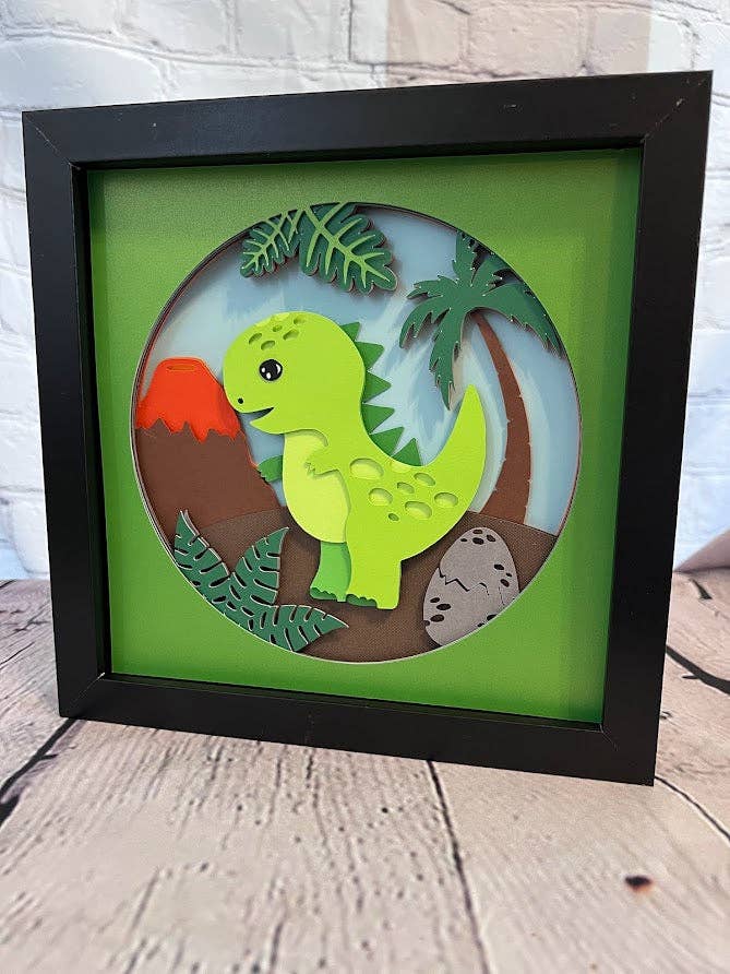 Olivia Reagan Designs – Engroshandel 3D-vægkunst – T-Rex tegneserie 3D-papirkunst i en skyggeboks