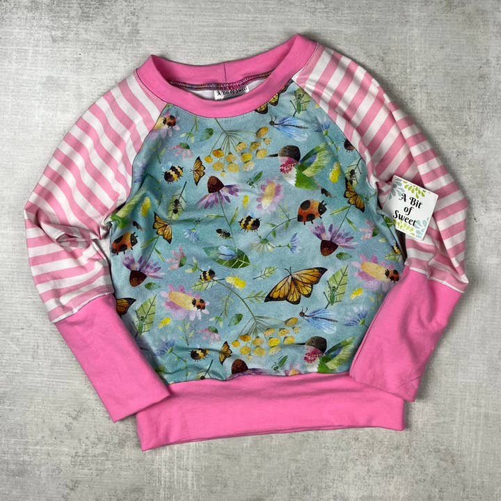 Pollinators Grow with Me Shirt for wholesale by A Bit Of Sweet