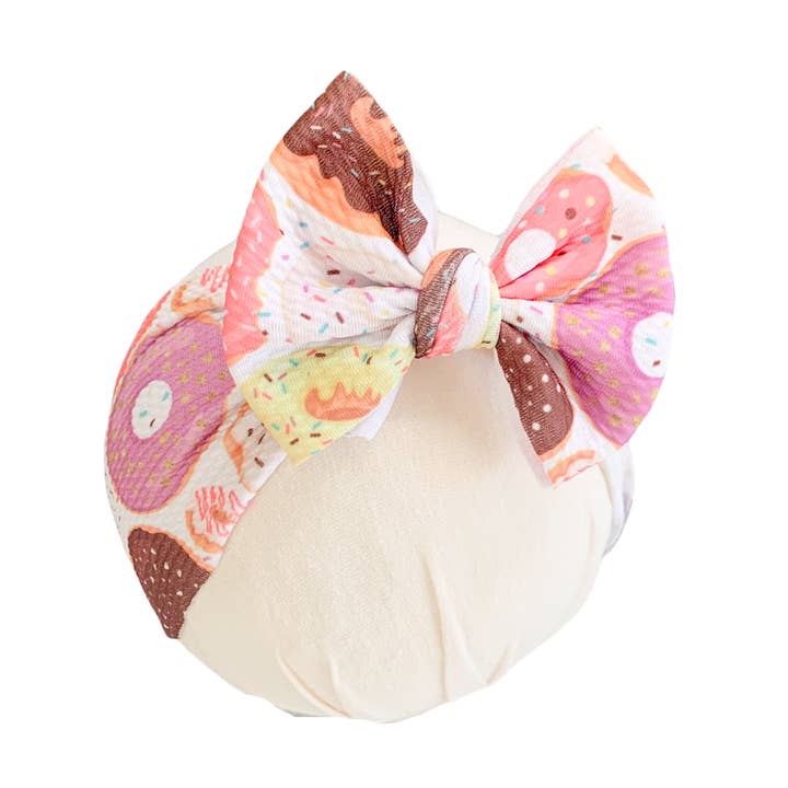 Donuts on white Headwrap Bow for wholesale by Tiny toes Baby Co