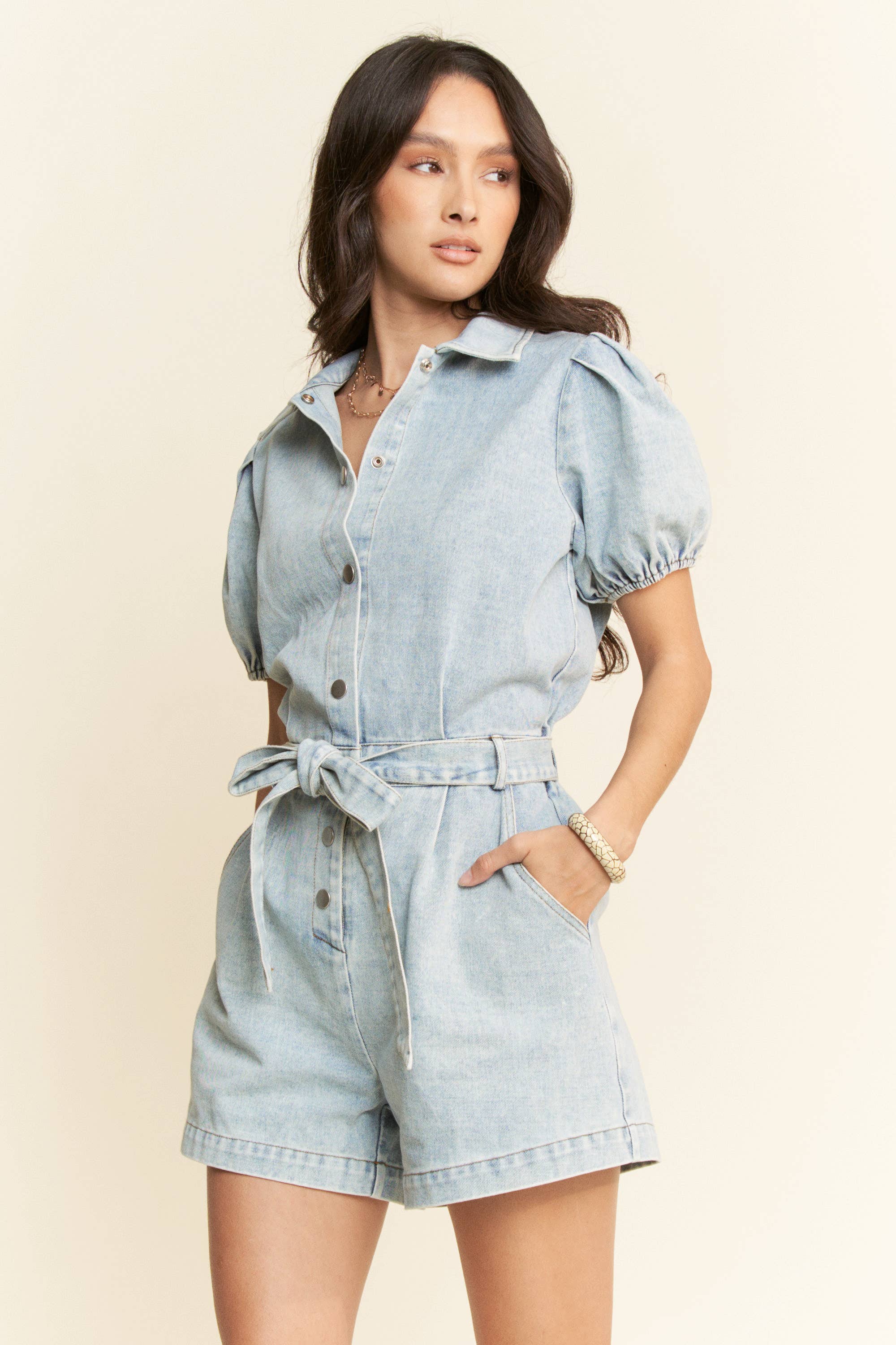 LIGHT DENIM FEATURING SHORT PUFF SLEEVES ROMPER for wholesale on Faire