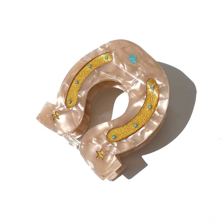 Hand-painted Lucky Horseshoe Hair Clip | Western and other Purchase wholesale eclipse. Free returns & net 60 terms on Faire trending on Faire.