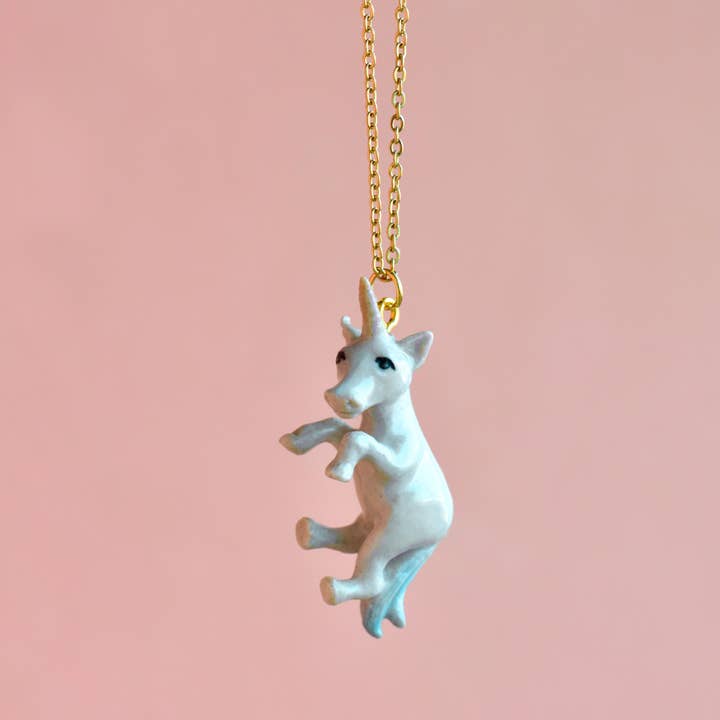 Baby Unicorn Necklace with Gold Horn for wholesale by Camp Hollow Porcelain Animal Treasures