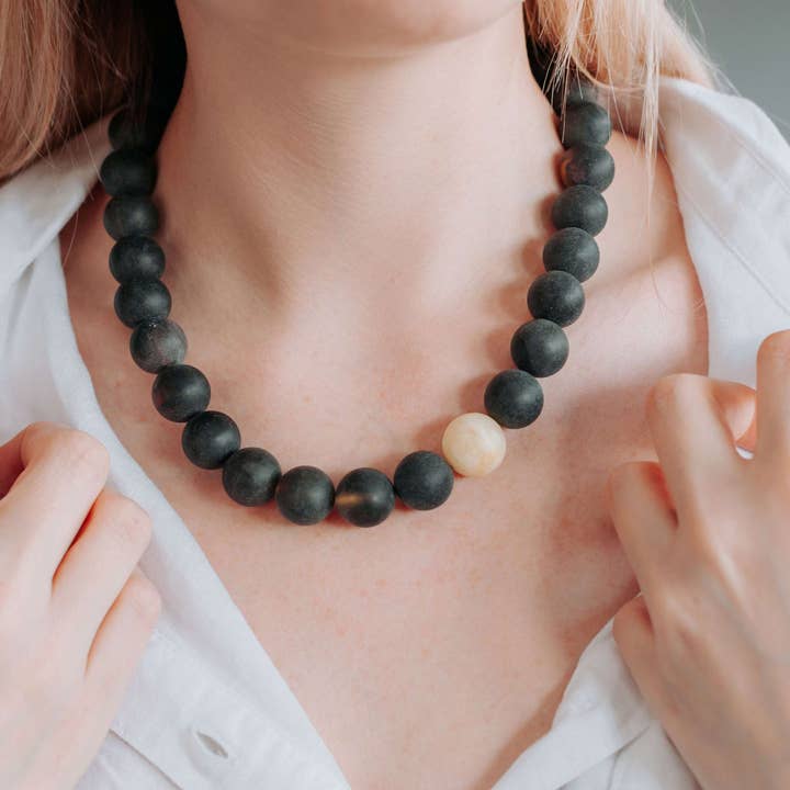 Black and White Amber Necklace Regular Beaded Necklace for wholesale by Marcin Waryszak