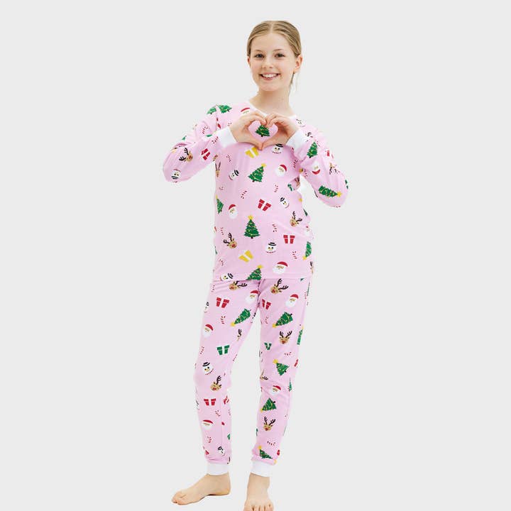 Le pyjama de Noël rose - enfant. pour la vente par Happy Seasons