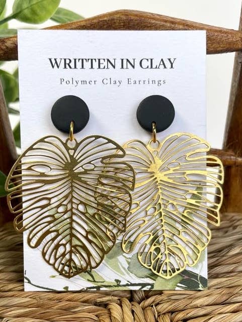 Brass Monstera Leaves on Black Clay Studs for wholesale by Written In Clay