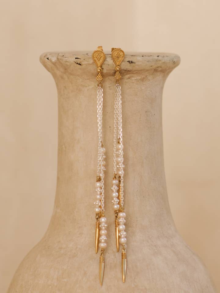 Kirana oorbellen - Messing X zilver combinatie voor wholesale door Nakila Collective