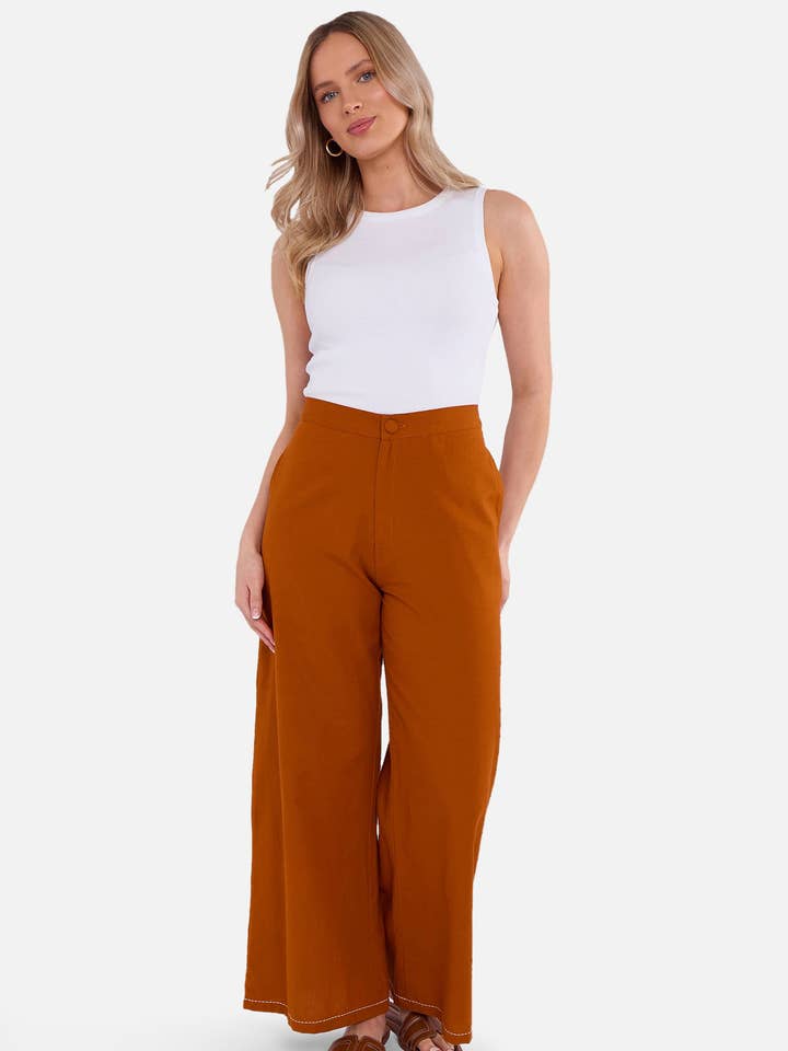 Pantaloni con Dettaglio di Ricamo a Contrasto Ruggine per la vendita all'ingrosso da parte di GINI LONDON