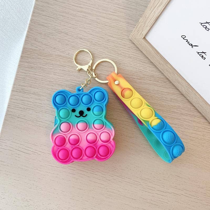 KiddieKickz - Wholesale Keychain - Kids - Small Keychain Coin Purse Spaceman Bear Fingertip Toy10
