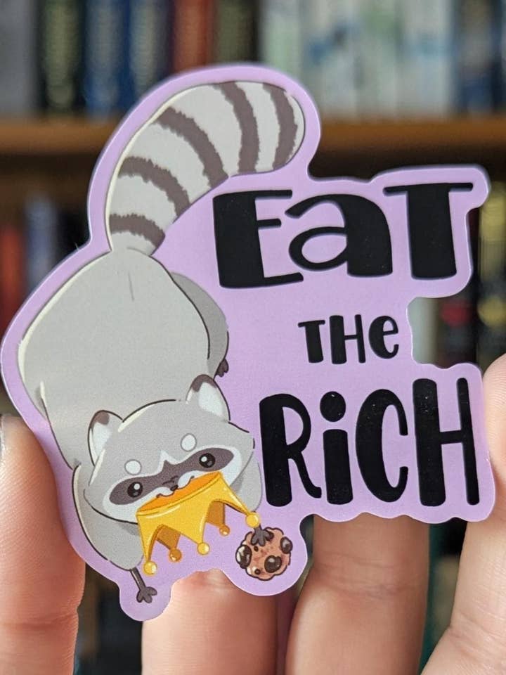 Eat the Rich chaotic raccoon vinyl sticker for wholesale by Geek and Artsy