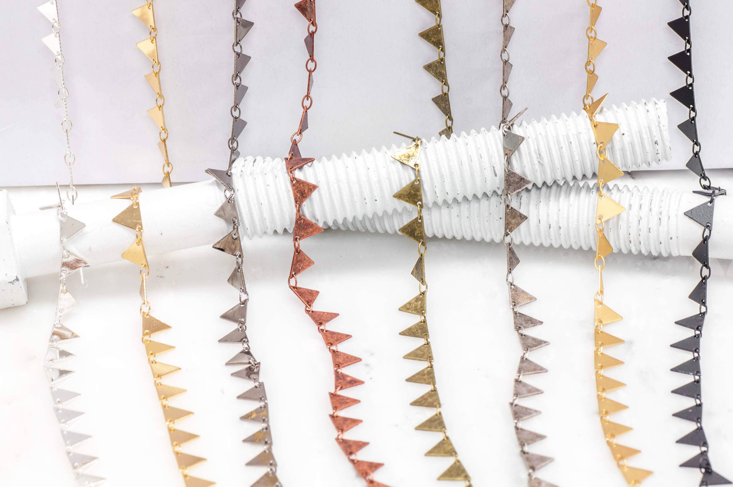 Continental Beads - Wholesale Craft Supplies - 7.25mm Solid Triangle Pennant Drop Specialty Chain Sold by The Foot - CH 9041