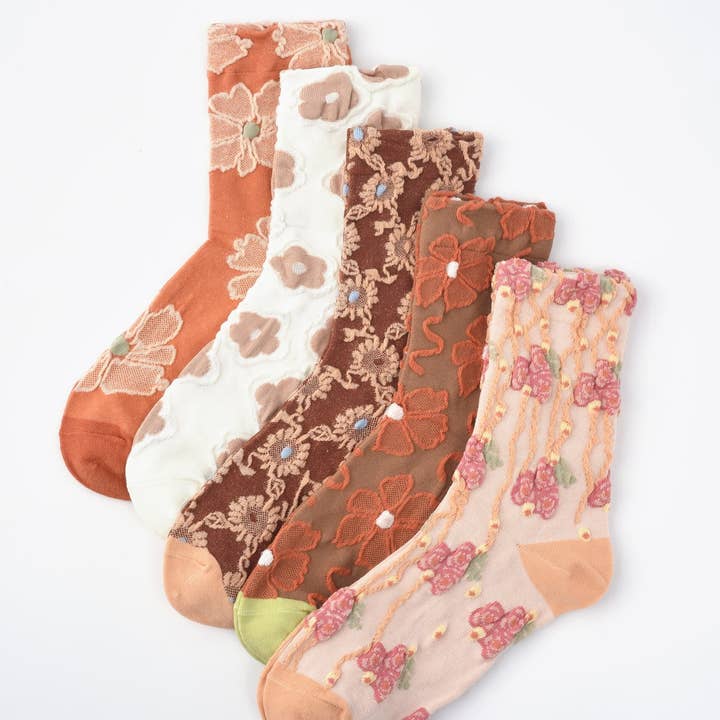 Rufia - Orange Embossed Women's Socks and other Purchase Wholesale calze. Free Returns & Net 60 Terms on Faire trending on Faire.