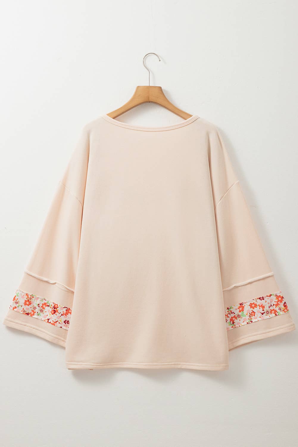 Beige Plus Size Flower Patched Side Slits Crewneck Top (S-4X) for wholesale on Faire6