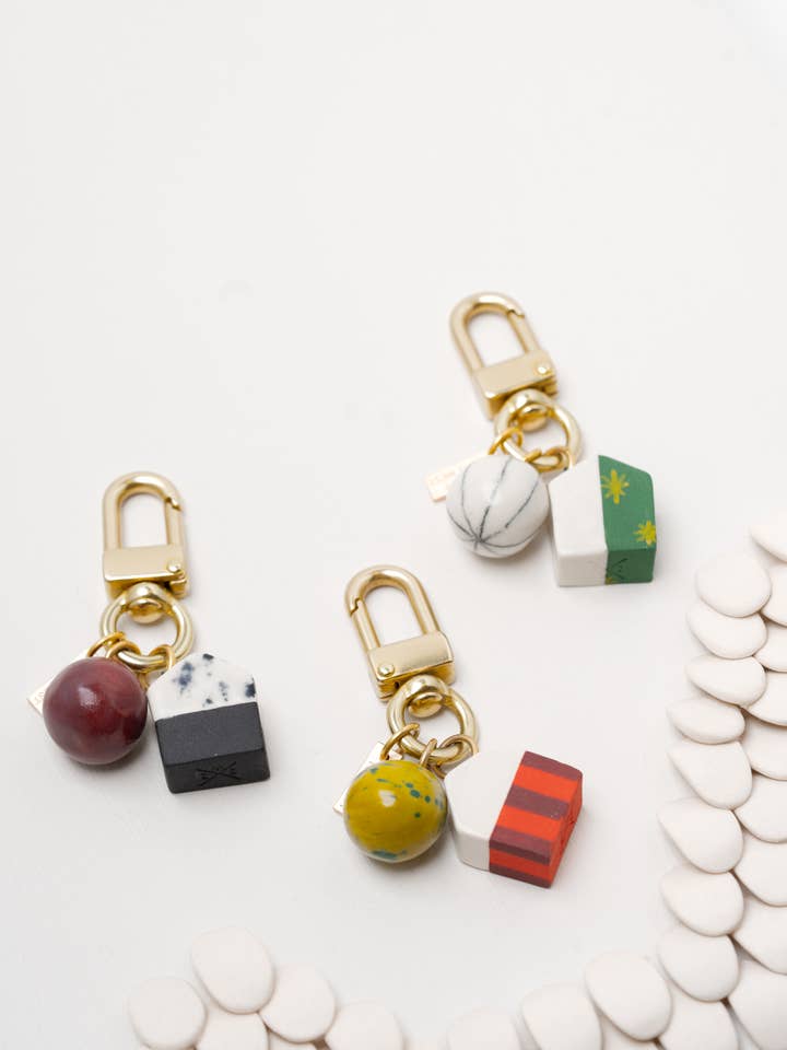 O Amuleto de Bolsa da Aldeia por atacado de Twenty Two West