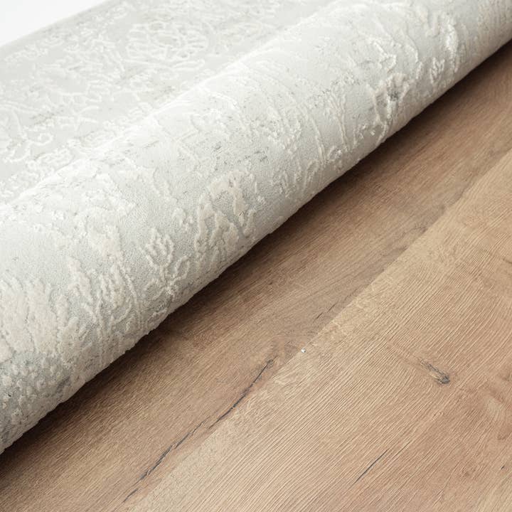 Ivory Gray Distressed Hi-Low Traditional Botanical Area Rug for wholesale on Faire
