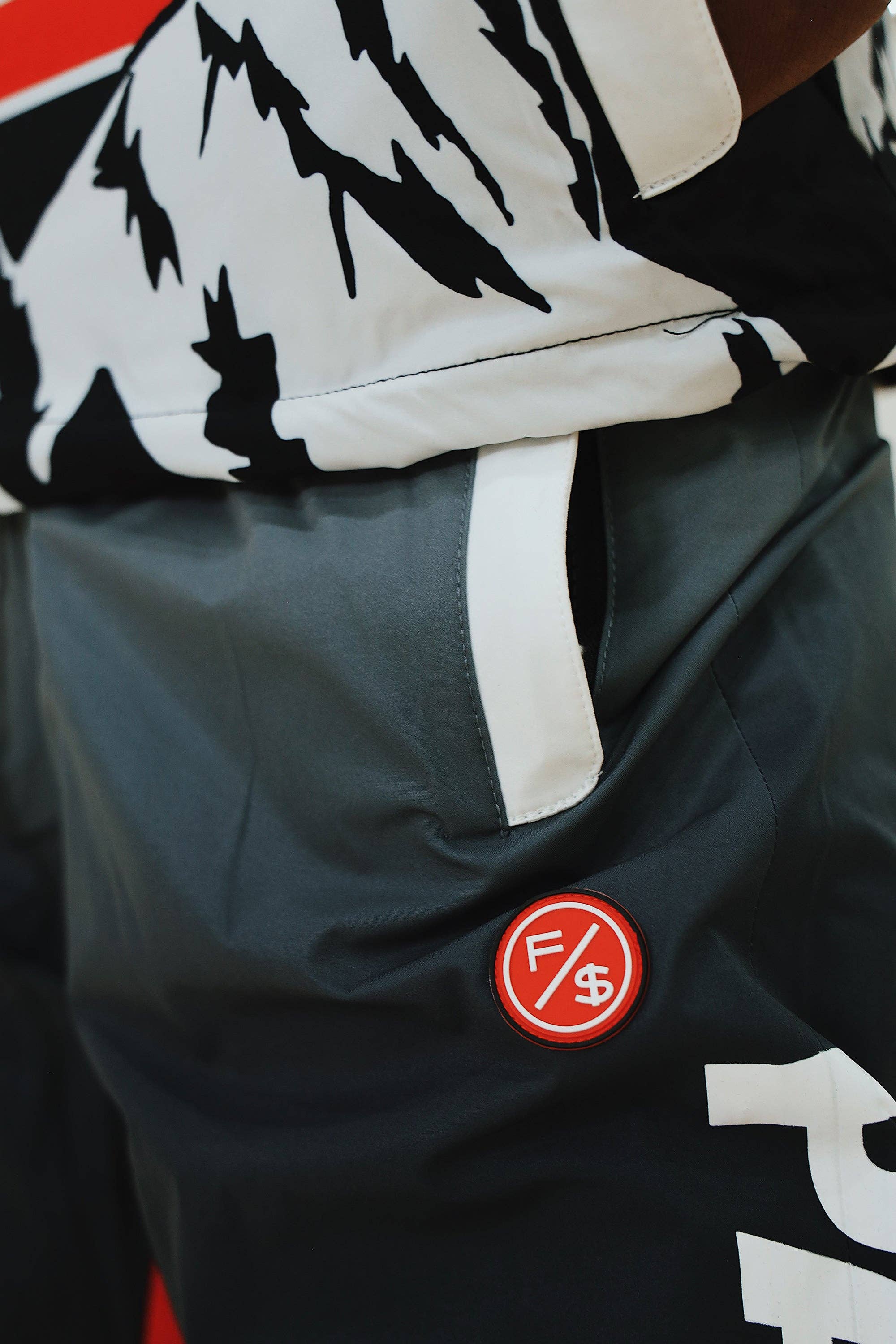 Black Paperchaser Windbreaker Pullover (Black) for wholesale on Faire18