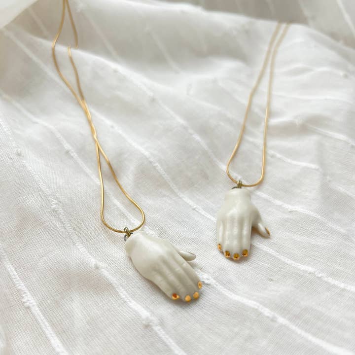 The Artifact House - Wholesale Pendant/Charm Necklace - Ceramic White and Gold Hand Pendant Necklace4